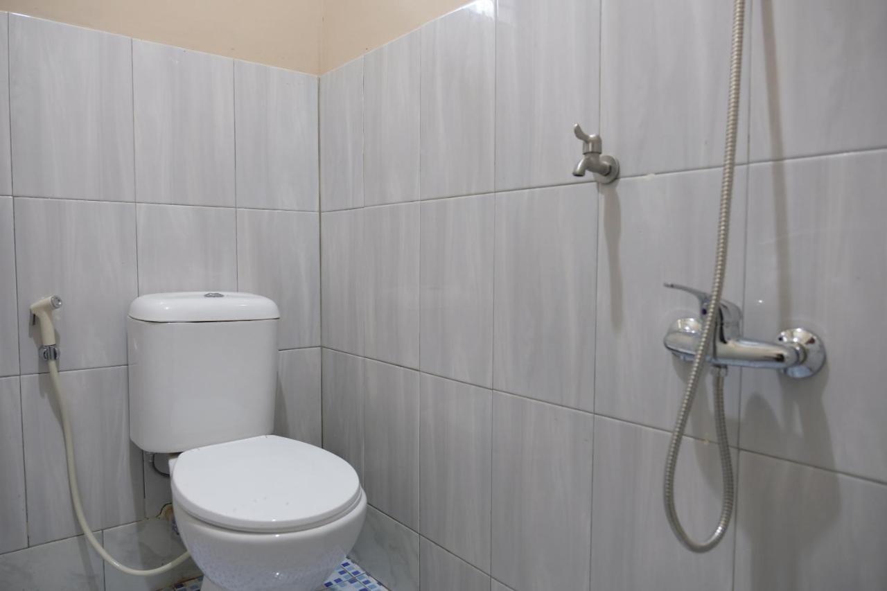 Oyo 1851 Homestay Joss Tanjungbinga Bagian luar foto